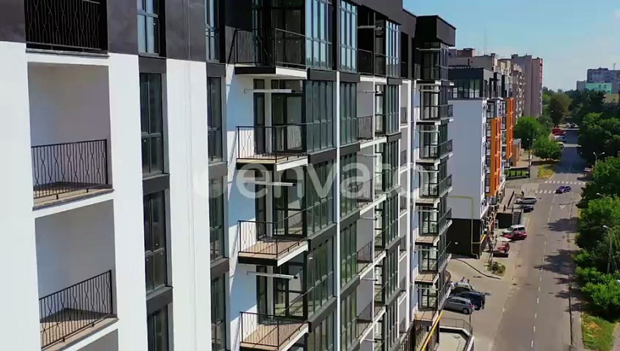 Newly built urban architecture. Exterior of residential building in the city.