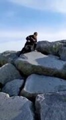 Kid Falls Hilariously After Slipping Off Rocks