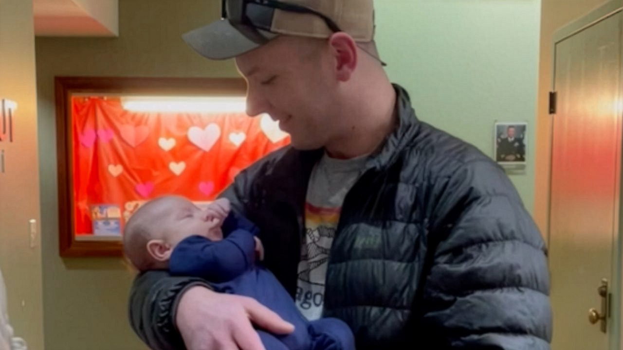 Military Dad Returns Home To Hold Baby For First Time