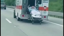 Urgent: Patient Falls Out of Moving Ambulance on Busy Highway