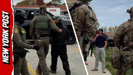 Federal agents carry out immigration arrests in Chicago on October 31 amid 'Operation Midway Blitz'