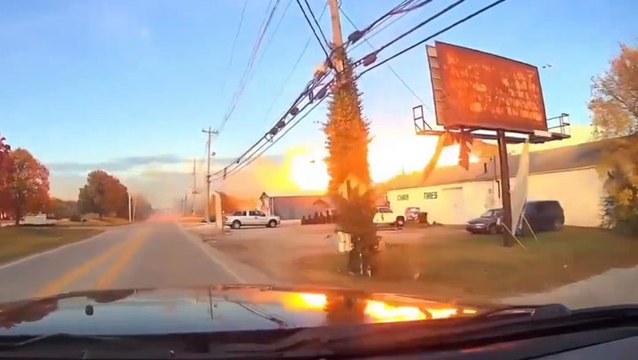 New video shows tire shop workers running for their lives as doomed UPS cargo plane explodes above them