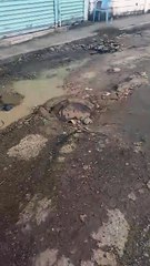 Vecinos de Villa Duarte denuncian deterioro de calle tras ciclón Melissa