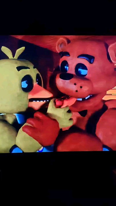 Freddy and Chica are Hugging and she is feeding Freddy a Hotdog/Freddica/Freddy x Chica/Five Nights at Freddy's/Fnaf