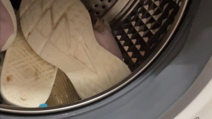 Girl puts sneakers in washing machine and ends up with a bigger mess