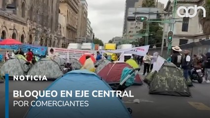 Bloqueo en Eje Central, comerciantes cierran vialidad con pancartas y casas de campaña