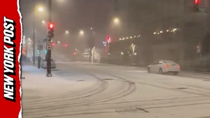 Chicago disappears in 'whiteout' as first winter storm blankets the city