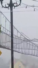 Typhoon Fung-Wong rocks walking bridge in Philippines
