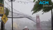 Bridge shakes wildly as deadly typhoon Uwan tears through Philippines