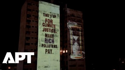 Activists Project “Message to Rich Polluters” on Amazon Building at COP30 in Brazil | APT