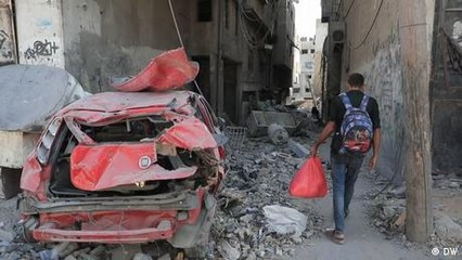 Gaza ceasefire: Palestinians return to war-torn homes