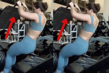 Video shows a woman strengthening her legs with a challenging workout routine