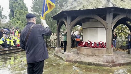 A Crediton Town Band musician plays Reveille to mark the end of the two minutes silence at Crediton War Memorial, video Alan Quick IMG_7742