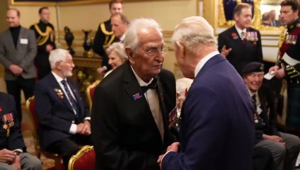 King embraces veteran who moved Queen to tears