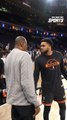 Karl-Anthony Towns dapping up Patrick Ewing and Spike Lee