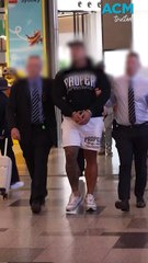 Sydney Airport arrest ends police hunt over violent shotgun attack in Carnes Hill, NSW