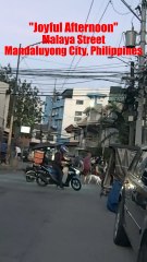 Joyful Afternoon on Malaya Street in Mandaluyong City in the Philippines