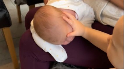 Toddler gets jealous and reacts hilariously to arrival of baby sister