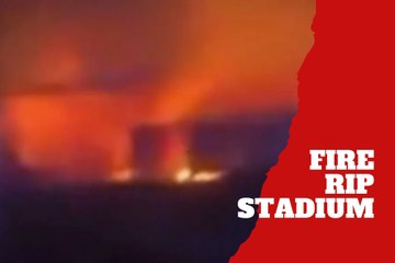 Dramatic footage shows huge fire rip through football stadium