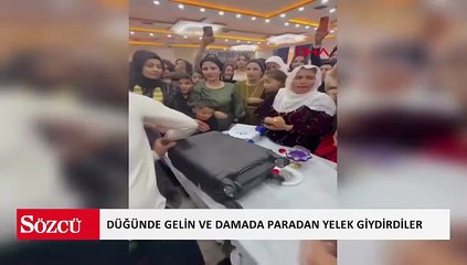 Düğünde gelin ve damada paradan yelek giydirip, taç taktılar
