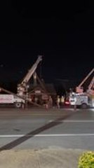 Worker Is Lifted High Off Ground After Clinging to Pole Pulled by Crane