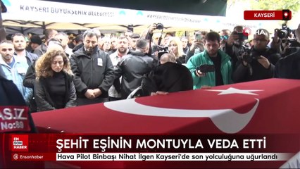 Kayseri'de şehit eşini askeri montuyla son yolculuğuna uğurladı