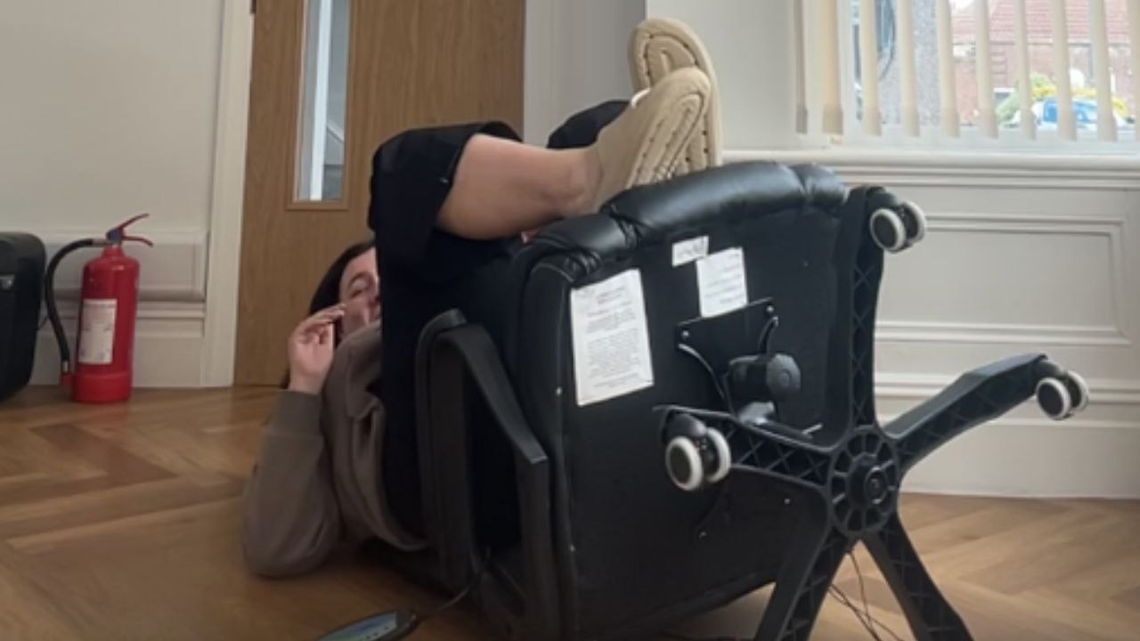 Girl tries to see if her chair snaps and ends up falling backward