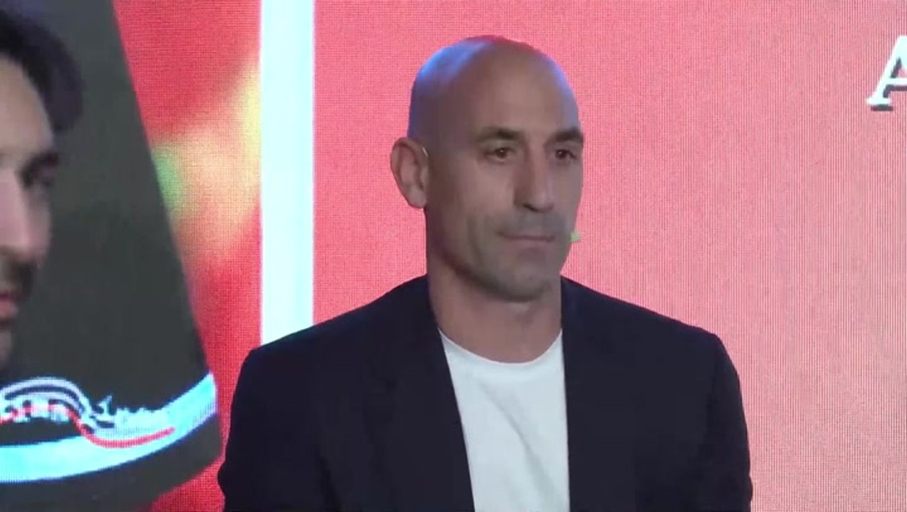 Moment former Spanish football president Luis Rubiales is pelted with eggs at book launch