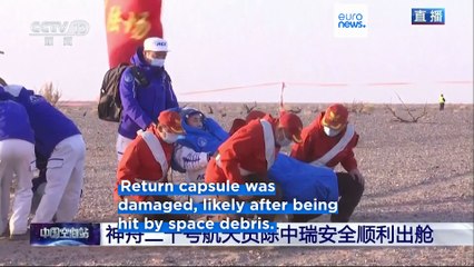 Chinese astronauts return to Earth after delay blamed on space debris damage