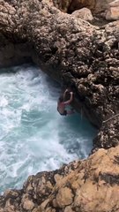 Narrow Escape! Man Nearly Gets Trapped by Massive Ocean Wave in Sea Cave