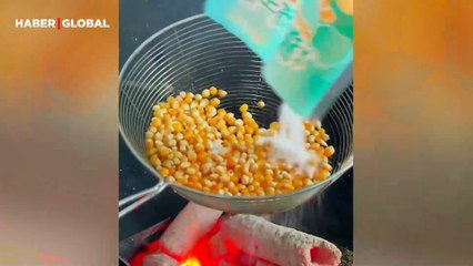 Çinli kadının mısır patlatma yöntemi viral oldu