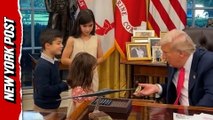 President Trump greets kids visiting Oval Office