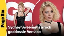 Sydney Sweeney is a rock and roll goddess in slinky black Versace dress at GQ Men of the Year party