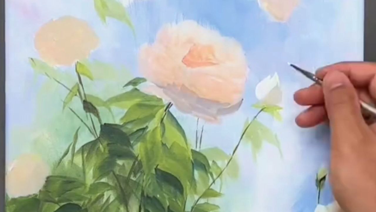 Artist transforms blank canvas into serene masterpiece featuring flowers blooming under blue sky