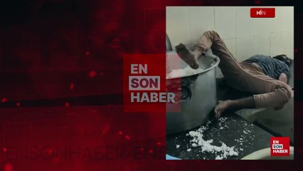 Hindistan’da sarhoş yurt görevlisi pirinç kasesine ayağını batırarak uyudu