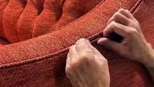 The_making_of_our_buttoned_back_Eaton_sofa…__Watch_as_one_of_our_talented_artisans_carefully_slip_stitches_the_fabric_securely_in_place,_a_detail_that