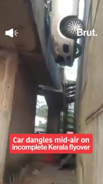 Car dangles mid-air