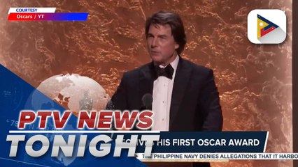 Tom Cruise receives his first Oscar award