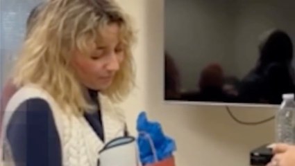 Republican gives ‘prison care package’ with holy water to ‘possessed’ Democrat opponent facing federal charges