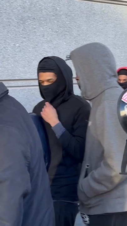 David Mosley berated by animal rights activists as he enters a Bronx court for tortuing and killing cat