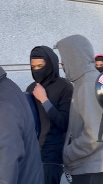 David Mosley berated by animal rights activists as he enters a Bronx court for tortuing and killing cat