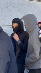 David Mosley berated by animal rights activists as he enters a Bronx court for tortuing and killing cat