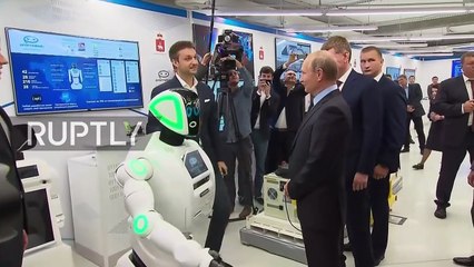 'Hello, Vladimir Vladimirovich' - Putin shakes hands with robot during Perm IT expo
