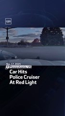 Car Hits Police Cruiser At Red Light