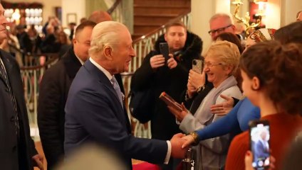 King greets delighted shoppers during shop visit