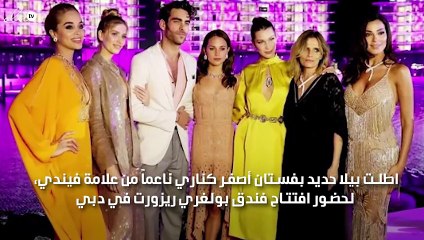 بيلا حديد متألقة بفستان أصفر في دبي