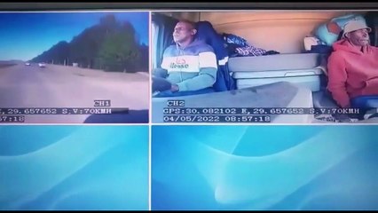 guy wrecks semi trying to remove sweater while driving