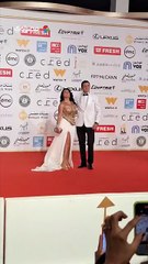 رانيا يوسف وزجها يرتديان الأبيض في ختام مهرجان القاهرة السينمائي