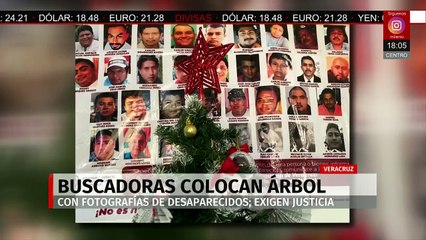 Madres en búsqueda colocan árbol con fotos de desaparecidos en la FGE de Coatzacoalcos