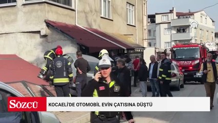 Kocaeli'de otomobil evin çatısına düştü